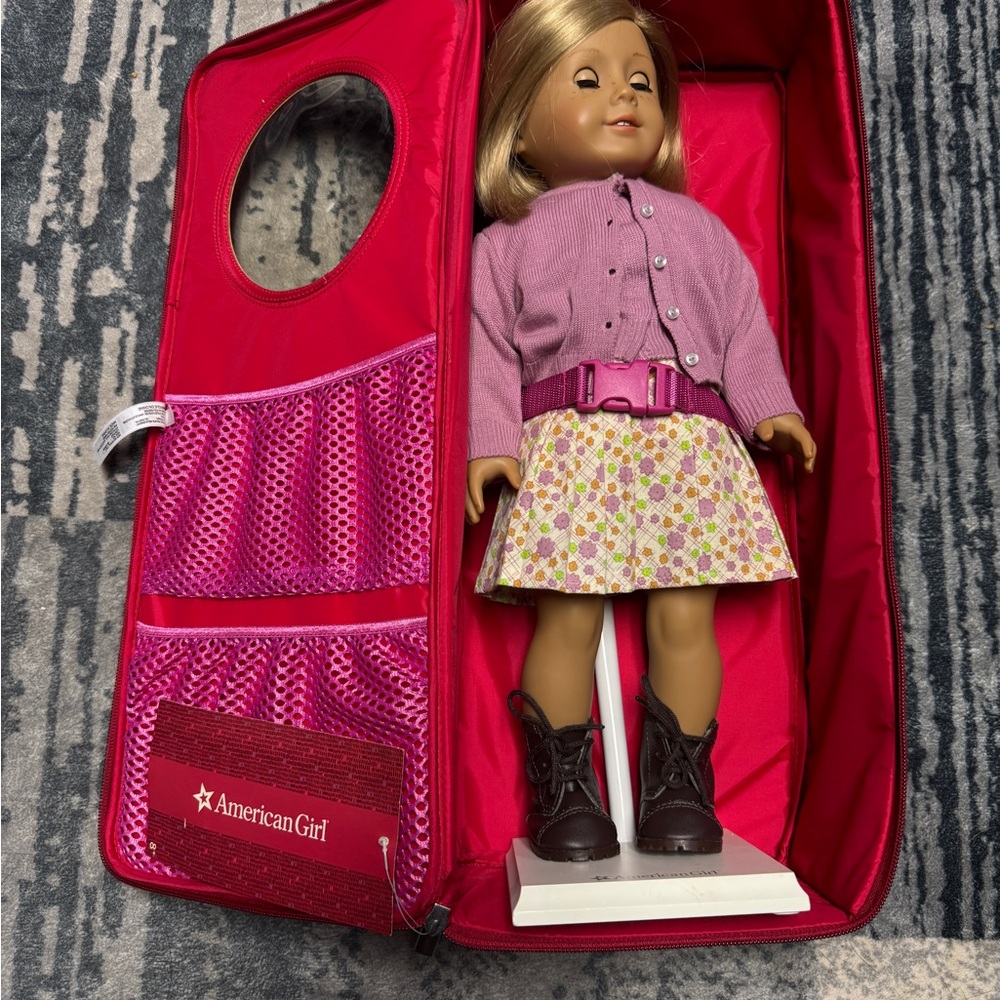 American Girl Doll in Purple Cardigan with Floral Skirt and Red Case
